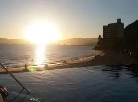 Maravilhoso Apto Beira-Mar Prainha, Caraguatatuba com Piscina e Sauna