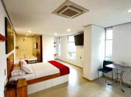 Hotel Portal Central, hotel con estacionamiento en Medell&iacute;n