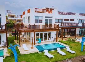BungaLoose Casa Jaws Oceanfront, hotel v destinaci Cataltzul
