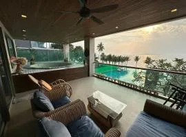 Luxury Beachfront Condo with Ocean Views