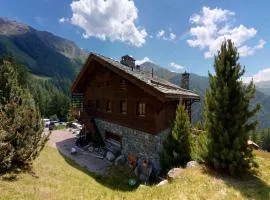Apartment on ski slopes of Prarion