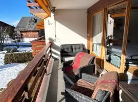 Central flat in Villars sur Ollon, Amethyste, for 4, with two double beds, balcony and 75m to ski-train