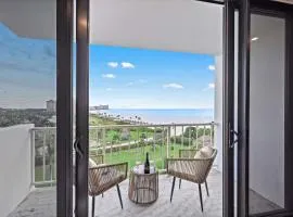 Beachfront condo with views of beach and spacious pool