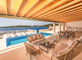 Beachfront Villa, 28 sqm Heated Infinity Pool, Open Sea Sunset Views - Villa Sunset, hotel di Sevid
