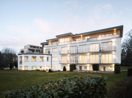 Hotel Vier Jahreszeiten an der Therme & Kliniken Bad Krozingen Nähe Freiburg & Schwarzwald Ideal für Wellness Kur & Business Ausflüge 24h Check In- WLAN & Parken gratis, hotel v destinaci Bad Krozingen
