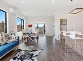 Modern Beach Retreat 4 bedrooms, hotel en Papamoa