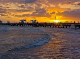 Beach Front Holiday Home with Pool, Prime Location