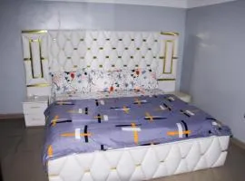 Whitney white 1bedroom shortlet apartment 24hr light Stadium Road N58,000