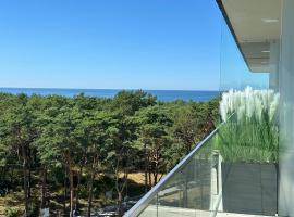 Hevenia Apartament 75 z bocznym widokiem na morze, hotel in Mrzeżyno