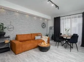 Bright Apartment with Terrace & Parking near Metro Kondratowicza by Noclegi Renters