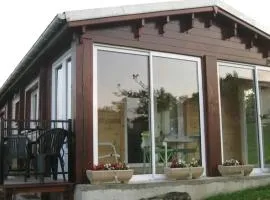 Chalet accueillant à Égliseneuve-des-Liards avec jardin