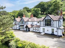 Delightful holiday home with sea views and Hot Tub, hotel in Penmaen-mawr