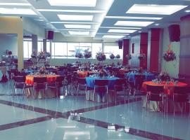 Palmar Central Mall Hotel, hotel a El Guabo