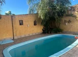 Acomodação no centro da cidade com piscina