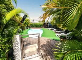 Maison charmante à Sainte-Anne avec piscine partagée.