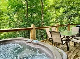 GAME ROOM, PRIVACY, AND A HOT TUB! 2 bedroom cabin with great outdoor spaces