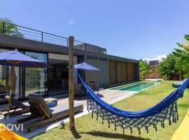 Casa com Piscina na Praia de Tatuamunha by Qavi