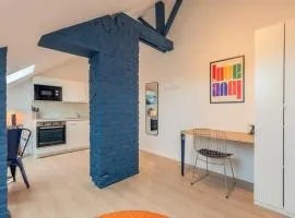 Studio sous les combles côté rue, parking gratuit