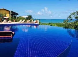 Quarto e sala com piscina em Maceió - Villas Tulipa 02