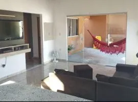 Casa da Cris em Praia do Grauçá com Wi-Fi, ar condicionado e garagem