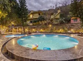 ELIVAAS Zephyr Sierra - 2 BHK Hillside Retreat With Common Pool, Gym & Restaurant