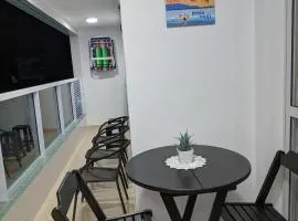 Apto completo com varanda gourmet a 50 mt da praia