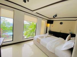 Castle View Hotel Resort, hotel em Magamomo