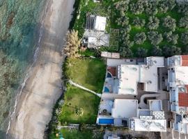 Adelphes Beachfront Apartment with direct connection to the beach