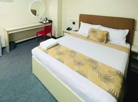 Marianne Suites Hotel by RedDoorz