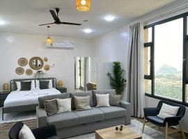 Roghan Hospitality Inn: Al Hamra şehrinde bir konaklama birimi