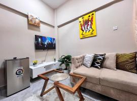 Vees Petite Home, hotel v mestu Nkunjila