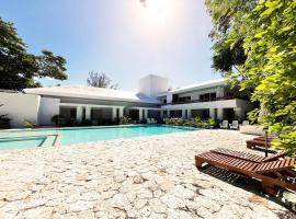 Beachside Tranquility Condo, hotel in Cozumel