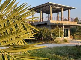 DHome and Gardens, Hotel in Phibun Mangsahan