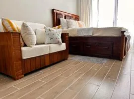 Mimah's cozy getaway near JKIA at Taurus Residences
