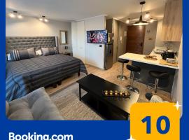 Acogedor c&eacute;ntrico full departamento condominio origen nuevo en puc&oacute;n, resort de esqui em Puc&oacute;n