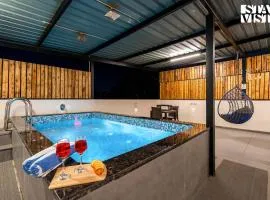 Serenity Skies Apartment with Pool by VEO - Part of StayVista