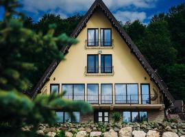 Aframe LINIȘTEA PĂDURII NĂMĂEȘTI, hotel in Nămăeşti