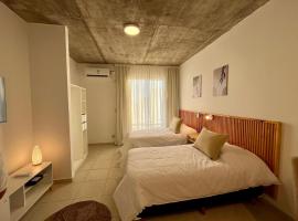 Monoambiente Muñíz, hotel in Luján