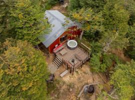 Cabaña en el Bosque con Cine Privado y Jacuzzi, hotel a Ushuaia