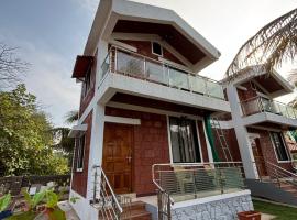 Coastal Breeze Resort, hotel in Surai