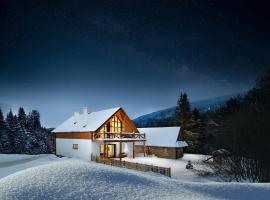 Chalet Oasis - Luxury 5-Bedroom Chalet with Panoramic Views, lodge in Huty