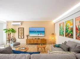 A deux pas de la plage de la BaieOrientale grand appartement avec jardin