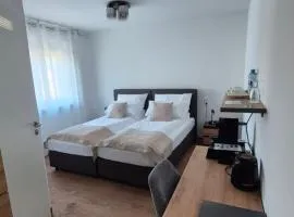 Apartments Seibel Doppel-Zweibettzimmer mit Bad