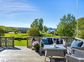 Serene Countryside Holiday Home with Fjord Views and blooming Gardens