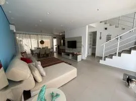 Casa Pé na Areia Boiçucanga