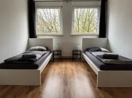 Case Four Boardinghouse mit Parkplatz, Küche, Waschmaschine und Trockner