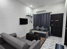 Homestay Una Kangar, acomoda&ccedil;&atilde;o com cozinha em Kangar