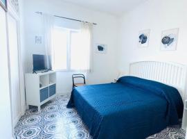 Eden Apartment, camera con cucina ad Anacapri