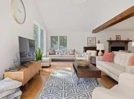 Bright 2BR Cabin with Sunroom Firepit Near Trails