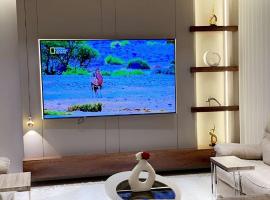 فيلا فندقية قريبة من المطار, caba&ntilde;a o casa de campo en Riad